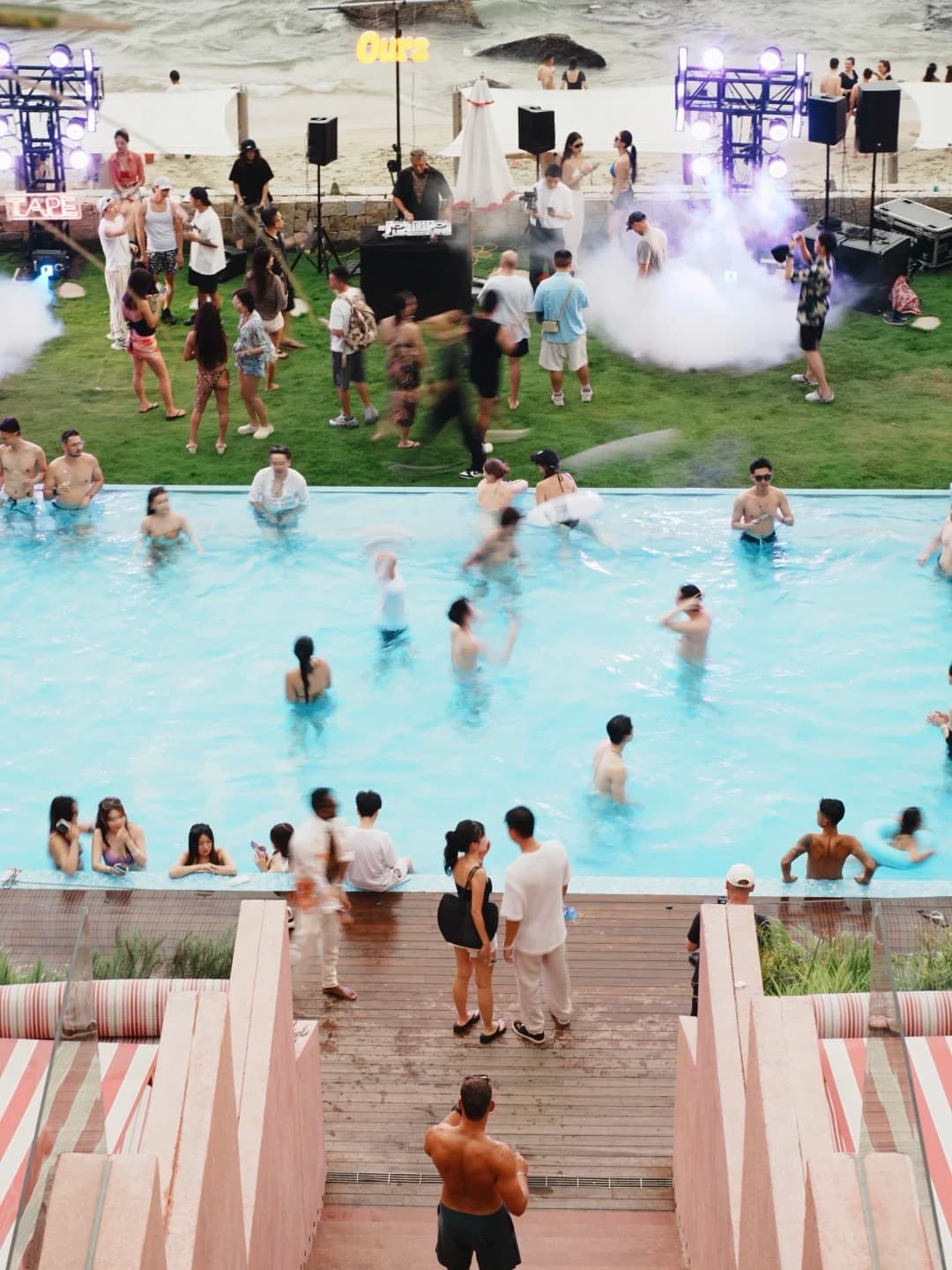 A daytime pool party at SENSEA resort