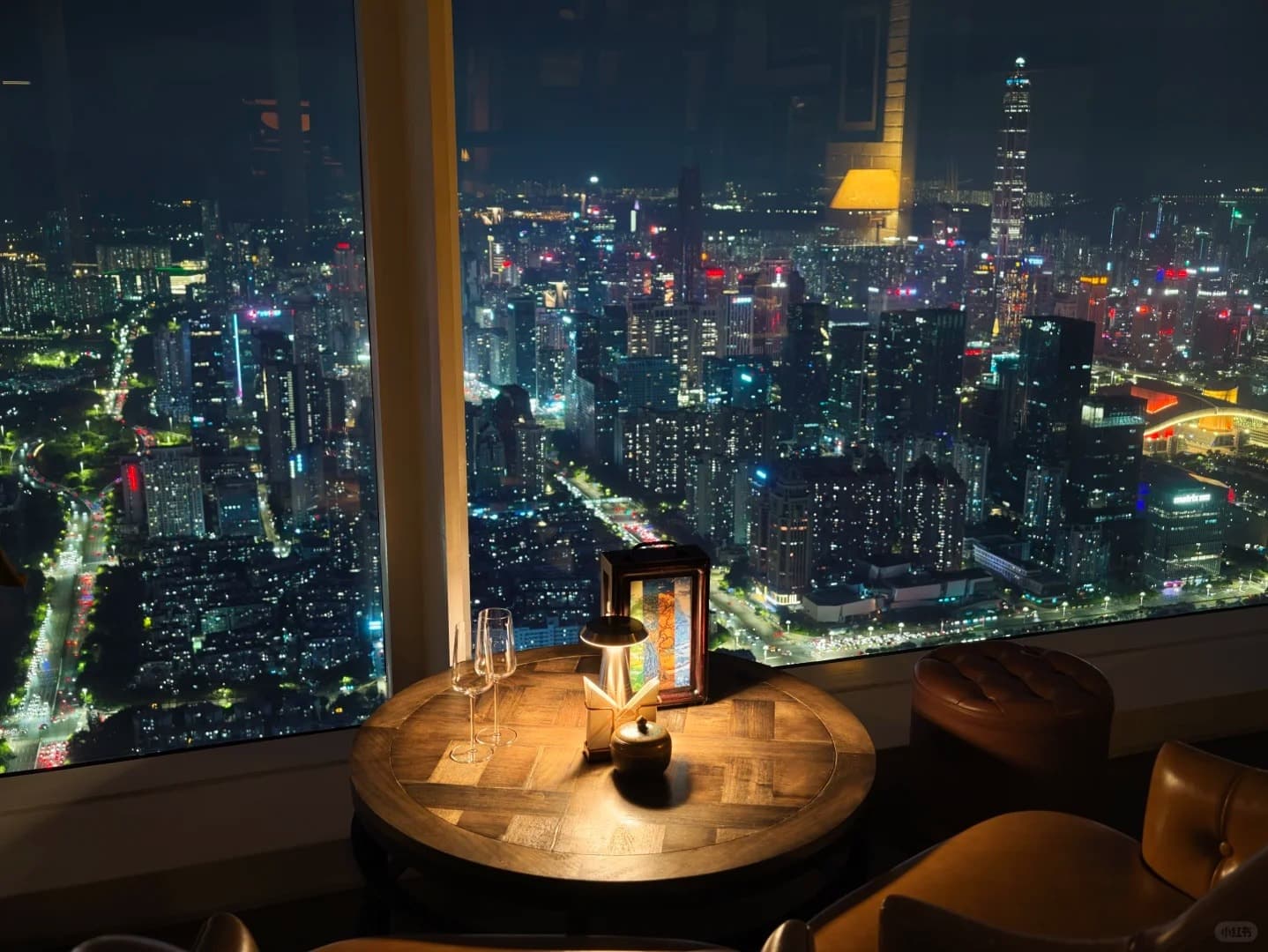 Window table at MO Bar, 79/F, over the Futian CBD at night
