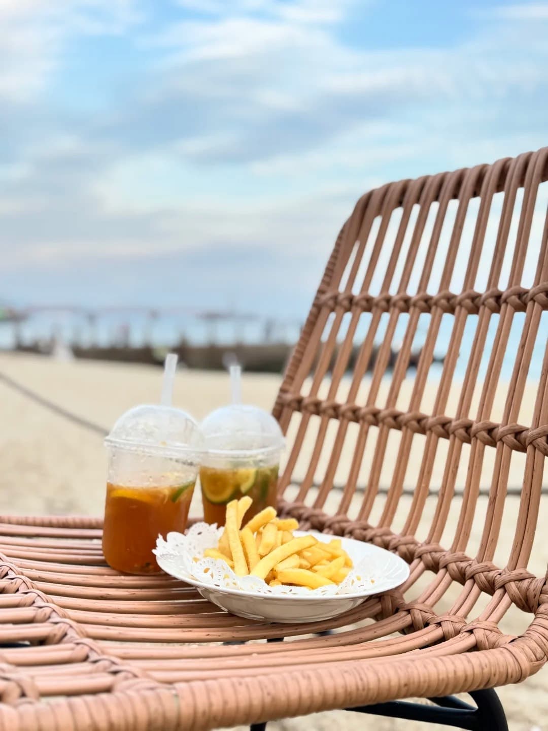 Drinks and fries on MOOON BEACH CLUB's terrace